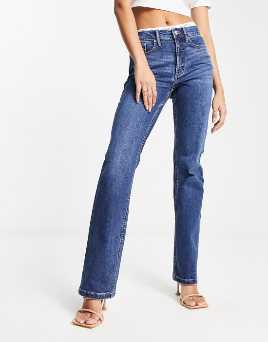 https://images.asos-media.com/products/calvin-klein-jeans-high-rise-bootcut-jeans-in-mid-wash/203736436-1-verona?$n_550w$&wid=550&fit=constrain