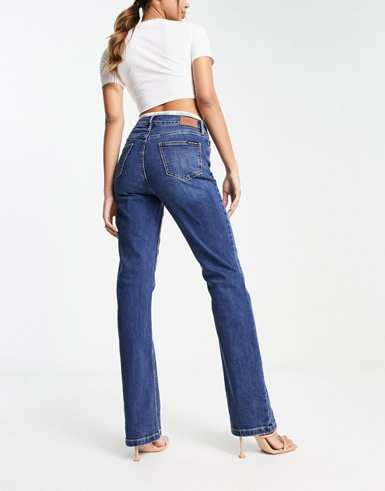 https://images.asos-media.com/products/calvin-klein-jeans-high-rise-bootcut-jeans-in-mid-wash/203736436-2?$n_550w$&wid=550&fit=constrain