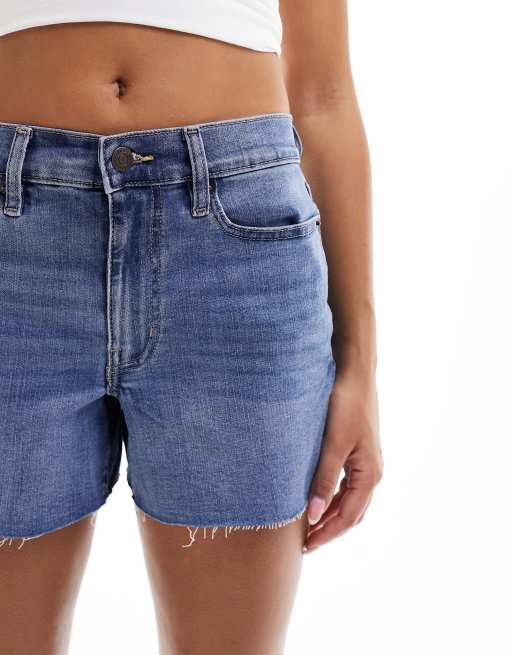 Calvin Klein Jeans high rise cut off shorts in blue