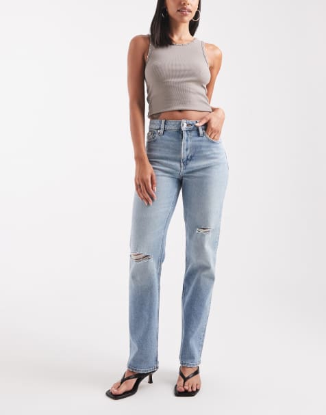 Calvin Klein Jeans high rise straight jeans with rip details in light wash blue - view 1