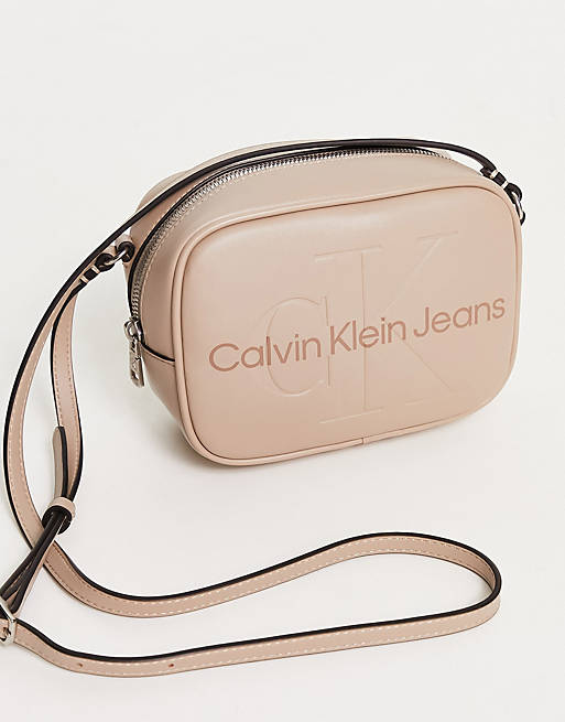 Calvin Klein Jeans industrial logo camera bag in beige | ASOS