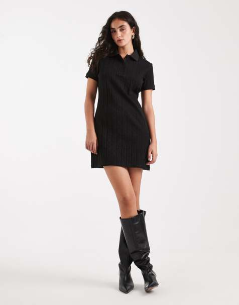 Calvin Klein Jeans jacquard emblem polo mini dress in black - view 1