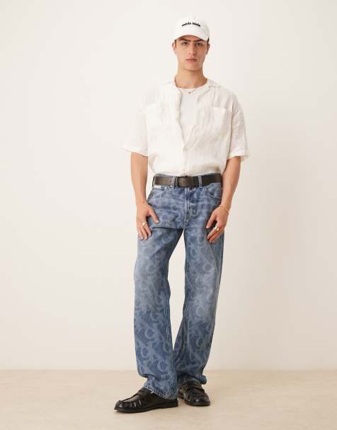 Calvin Klein Jeans - Jean droit style années 90 imprimé sur l'ensemble - Bleu moyen délavé - view 1