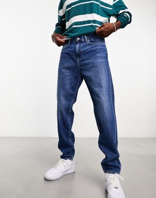 Calvin Klein Jeans regular tapered jeans in mid wash - ASOS Price Checker