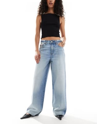 Calvin Klein Jeans - Jeans in Acid-Waschung mit weitem Bein und Splatter-Print-Blau