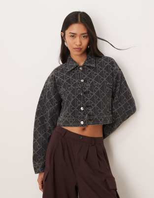 Calvin Klein Jeans - Jeansjacke in Schwarz mit Monogramm-Emblem-Print