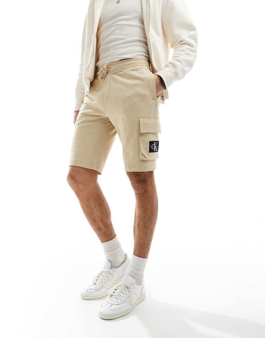 Calvin Klein Jeans jersey badge shorts in beige-Neutral