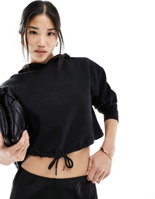 Calvin Klein Jeans – Kapuzenpullover in Schwarz mit Logo