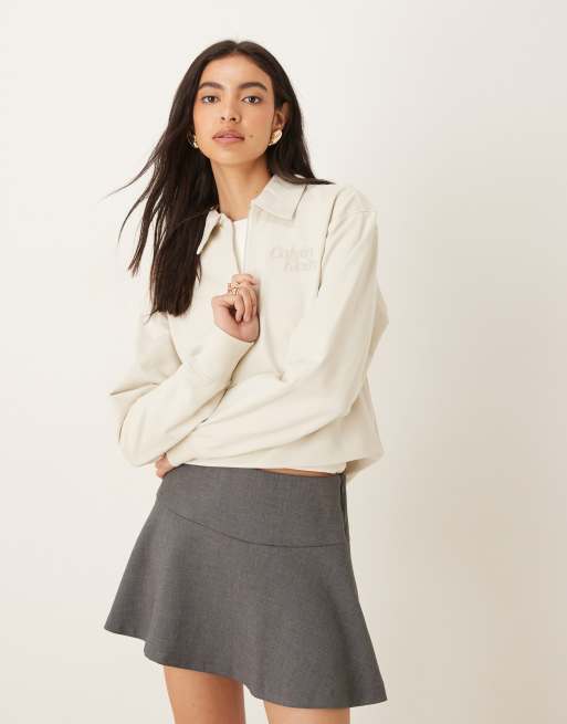 Calvin Klein Jeans – Koszulka polo w kolorze écru z długimi rękawami, logo i zamkiem pod szyją