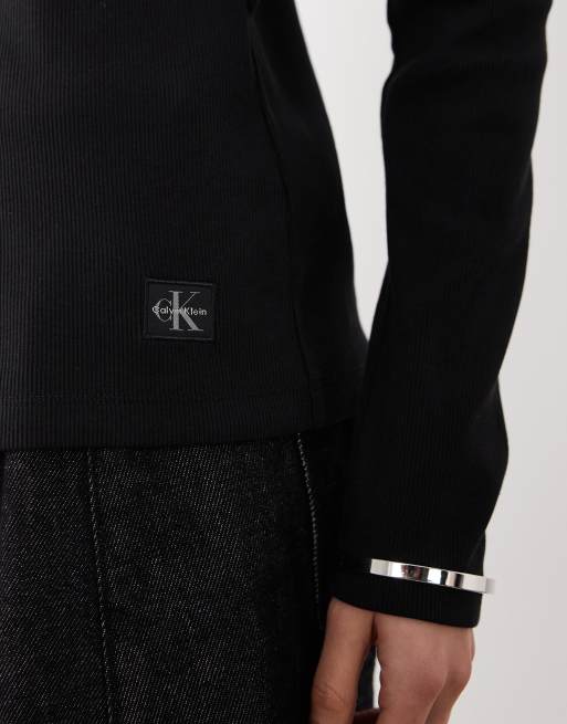 Calvin Klein Jeans – Langärmliges, geripptes Oberteil in Schwarz mit Knopfleiste, 3 von 6