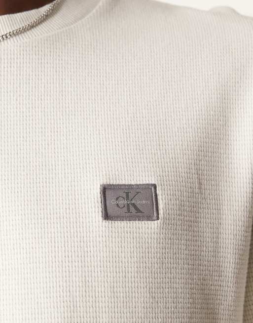 Calvin Klein Jeans – Langärmliges Oberteil in Wollweiß mit Waffelstruktur und Logo aus Webstoff, 2 von 4