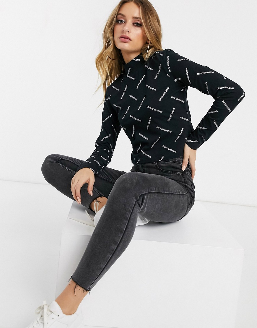 Calvin Klein Jeans - Langærmet top med høj krave og allover-logo-Sort