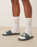 [Calvin Klein Jeans] Calvin Klein Jeans large logo sliders in teal lime and white-Green 45 Seaside Aqua/White