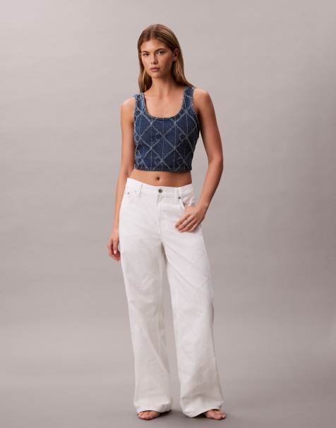 Calvin Klein Jeans laser cut repeat logo low rise baggy jeans in ecru