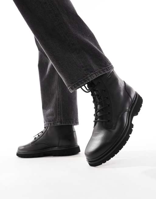 Calvin klein black leather boots new arrivals