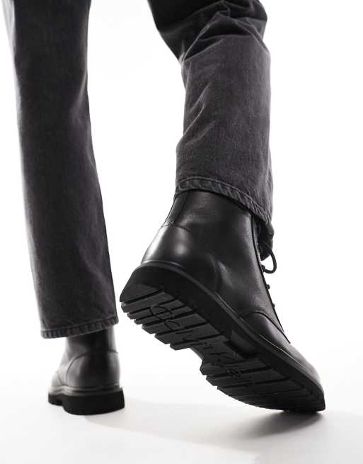 Calvin klein black leather boots new arrivals