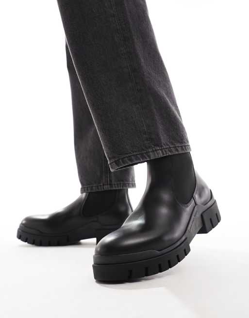 Calvin Klein Jeans leather low commuter boots in black | ASOS