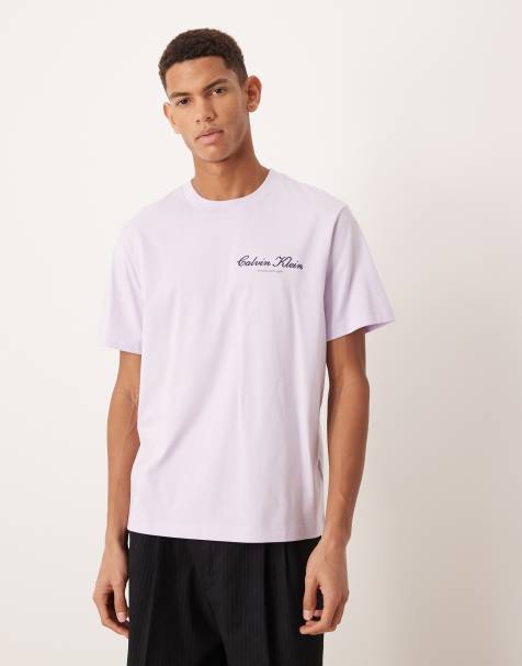 Calvin Klein Jeans – Liliowy T-shirt z grafiką - view 1