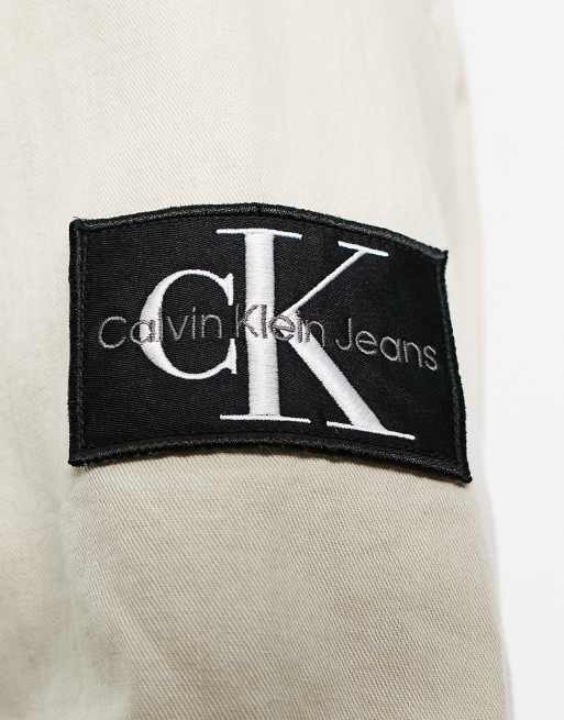 Calvin klein coat on sale tag on sleeve