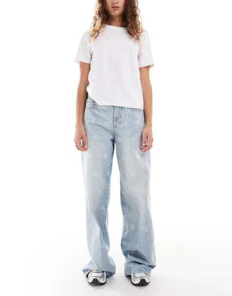 Calvin Klein Jeans – Ljusa, tvättade jeans med vida ben och sliten logga - view 1