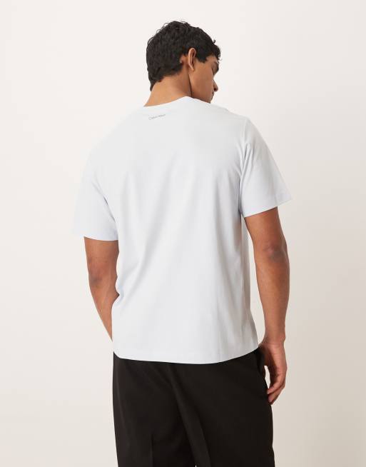 Calvin Klein Jeans – Ljusblå t-shirt med texttryck, 3 av 5