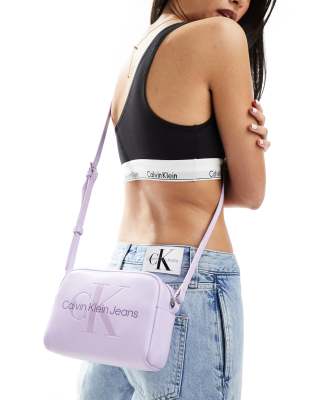 Calvin Klein Jeans logo camera bag in lilac ASOS