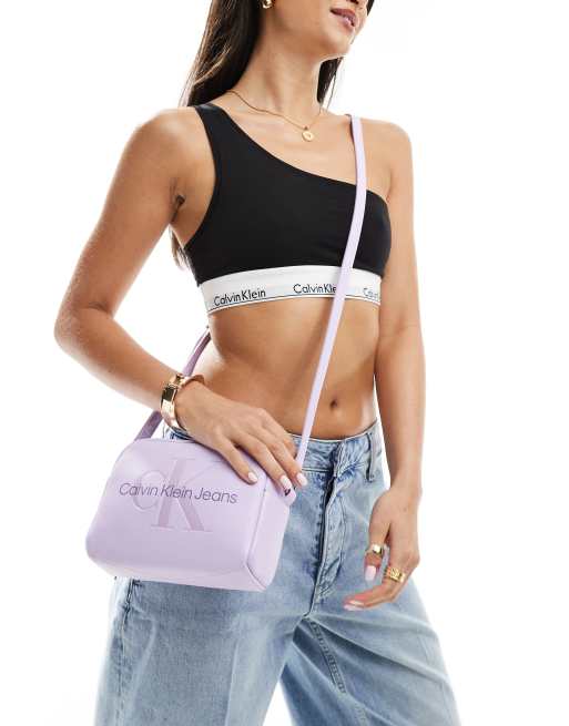 Calvin Klein Jeans logo camera bag in lilac ASOS