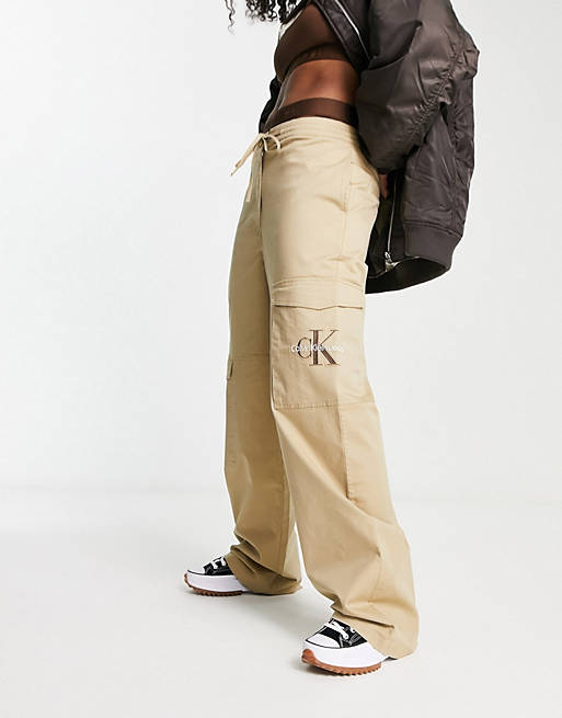 Calvin Klein Jeans logo cargo trousers in beige | ASOS