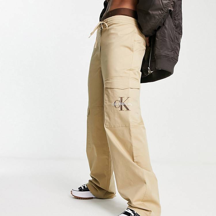 Calvin Klein Jeans logo cargo trousers in beige | ASOS