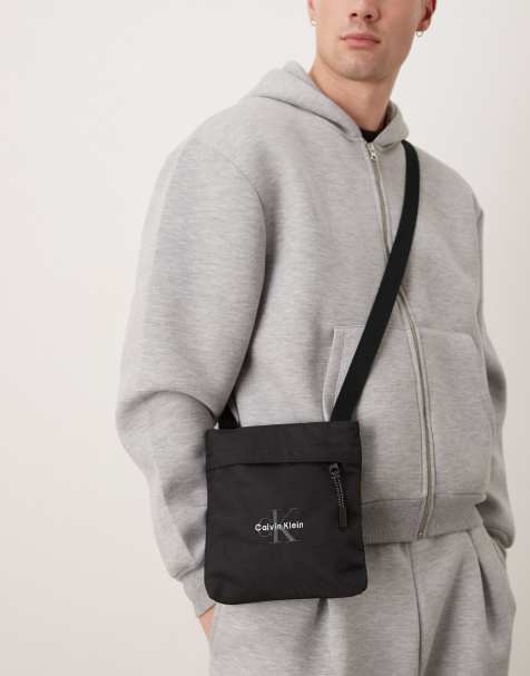 Calvin Klein Jeans logo cross body bag in black - view 1
