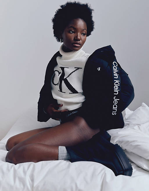 Calvin Klein Jeans logo drawstring short puffer jacket in black | ASOS