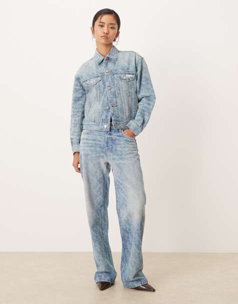 Calvin Klein Jeans logo print denim trucker jacket in lightwash blue - view 1