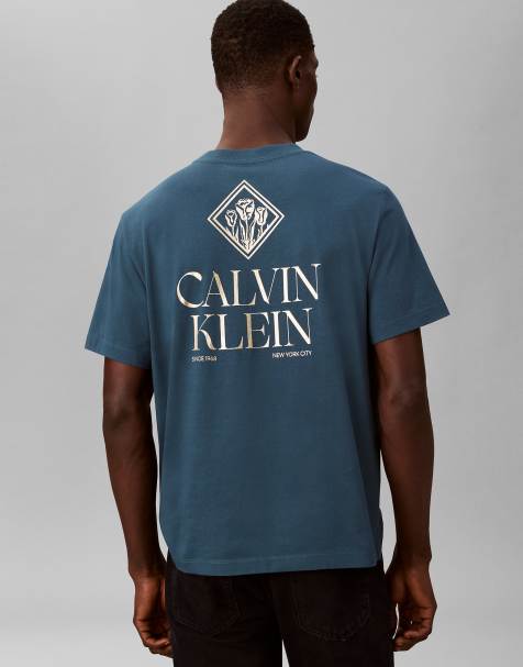 Calvin Klein Jeans Logo roses graphic classic t-shirt in navy teal