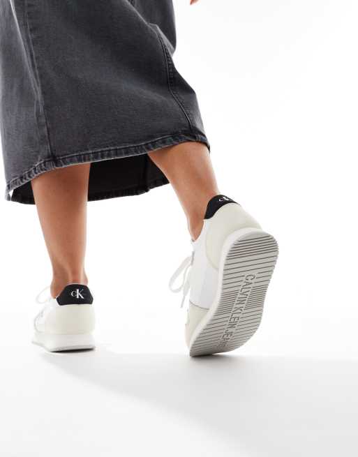 Calvin Klein Jeans logo runner sneakers in white & black | ASOS