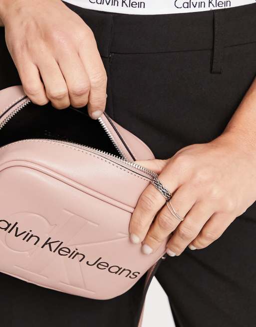 Calvin Klein signature crossbody bag in pink