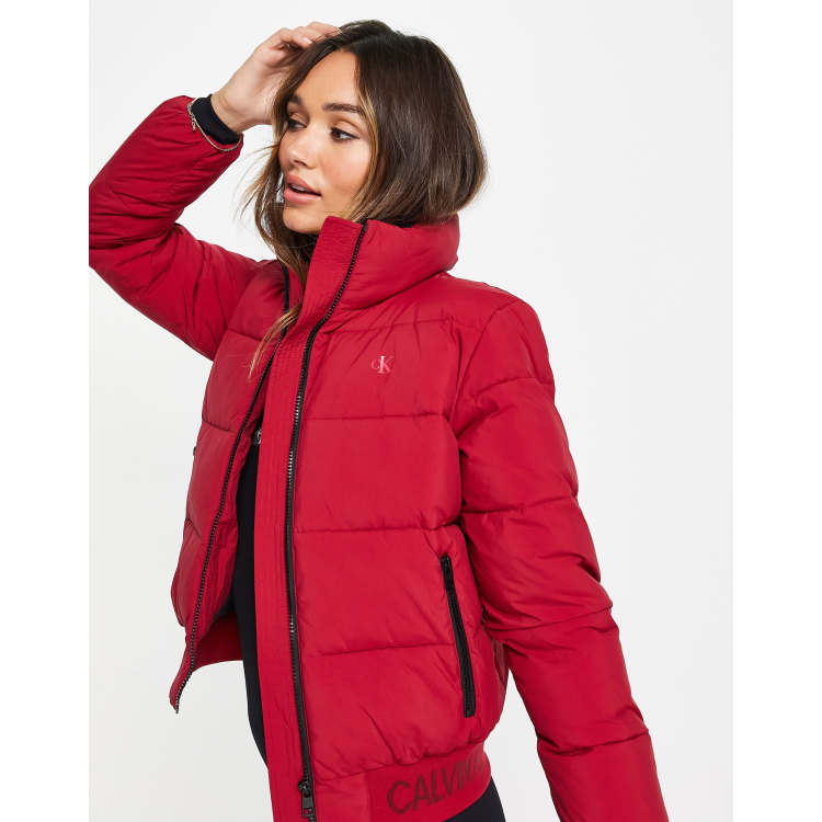 Calvin Klein Jeans logo trim puffer jacket in red