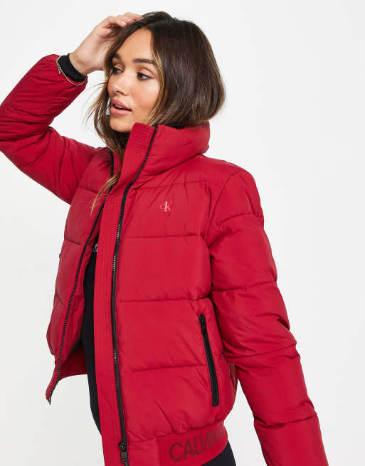 Calvin Klein Jeans logo trim puffer jacket in red