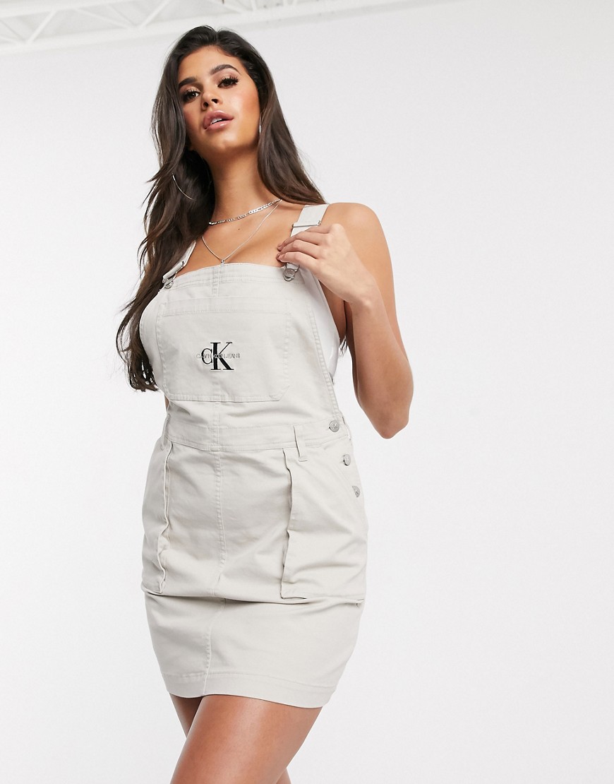 Calvin Klein Jeans logo utility dungaree dress in white