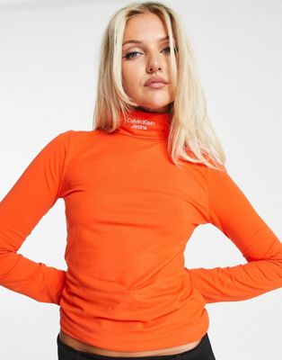 Calvin Klein Jeans long sleeve roll neck top in coral orange