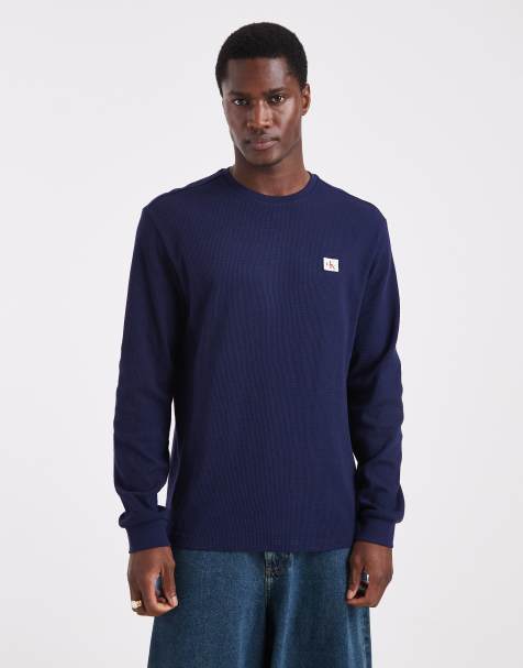 Calvin Klein Jeans long sleeve waffle knit badge logo t-shirt in navy - view 1