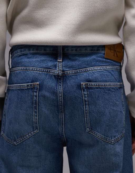 Calvin Klein Jeans - Løstsiddende jeans i mellemblå vask i 90'er-stil, 4 af 5