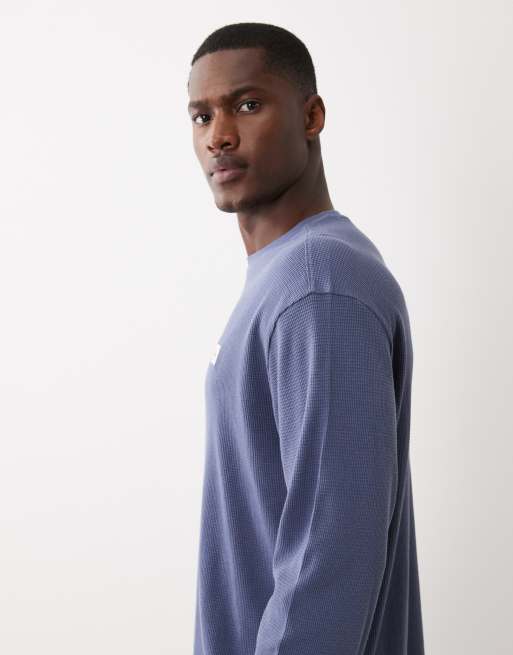 Calvin Klein Jeans - Maglietta a maniche lunghe blu a nido d'ape con stemma, 5 di 5