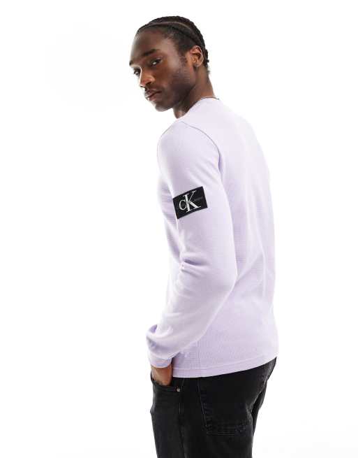 Calvin Klein Jeans Maglietta a maniche lunghe lilla pastello a nido d ape con logo ASOS