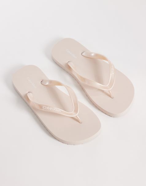 Calvin Klein Jeans metallic flip flops in pink - view 1