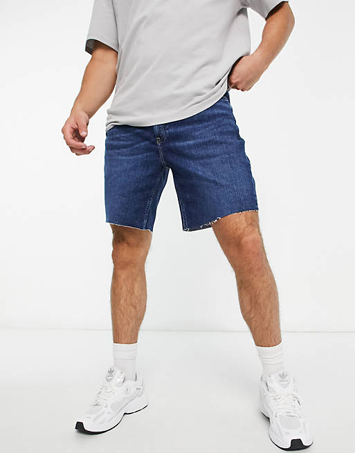 Calvin Klein Jeans mid thigh denim shorts in dark wash | ASOS