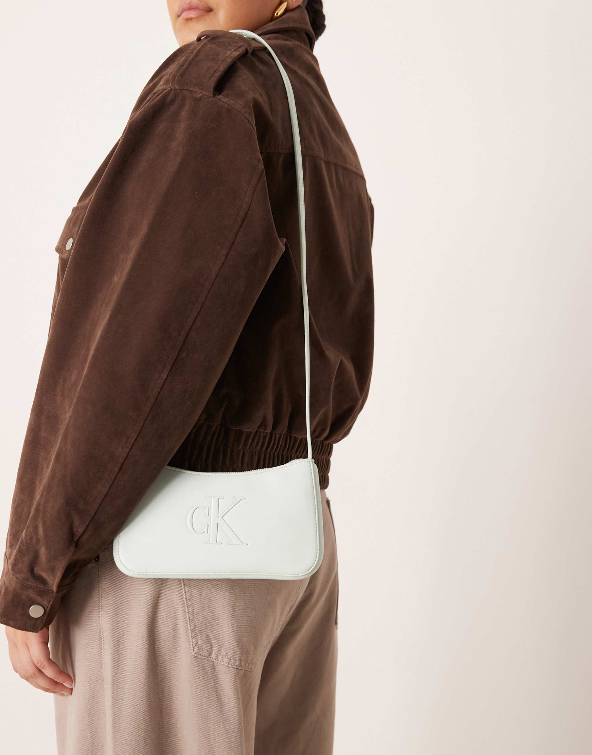 calvin klein jeans mini bold logo bag in blue