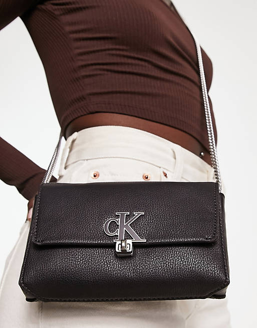 Calvin Klein Jeans minimal monogram phone crossbody bag in black | ASOS