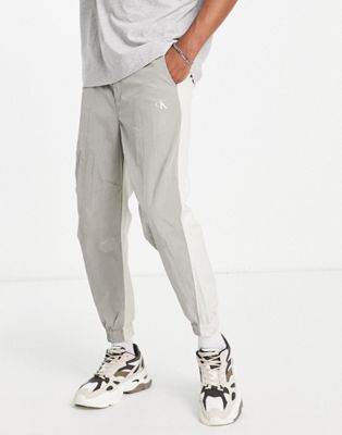 Calvin Klein Jeans mixed media ripstop trousers in stone