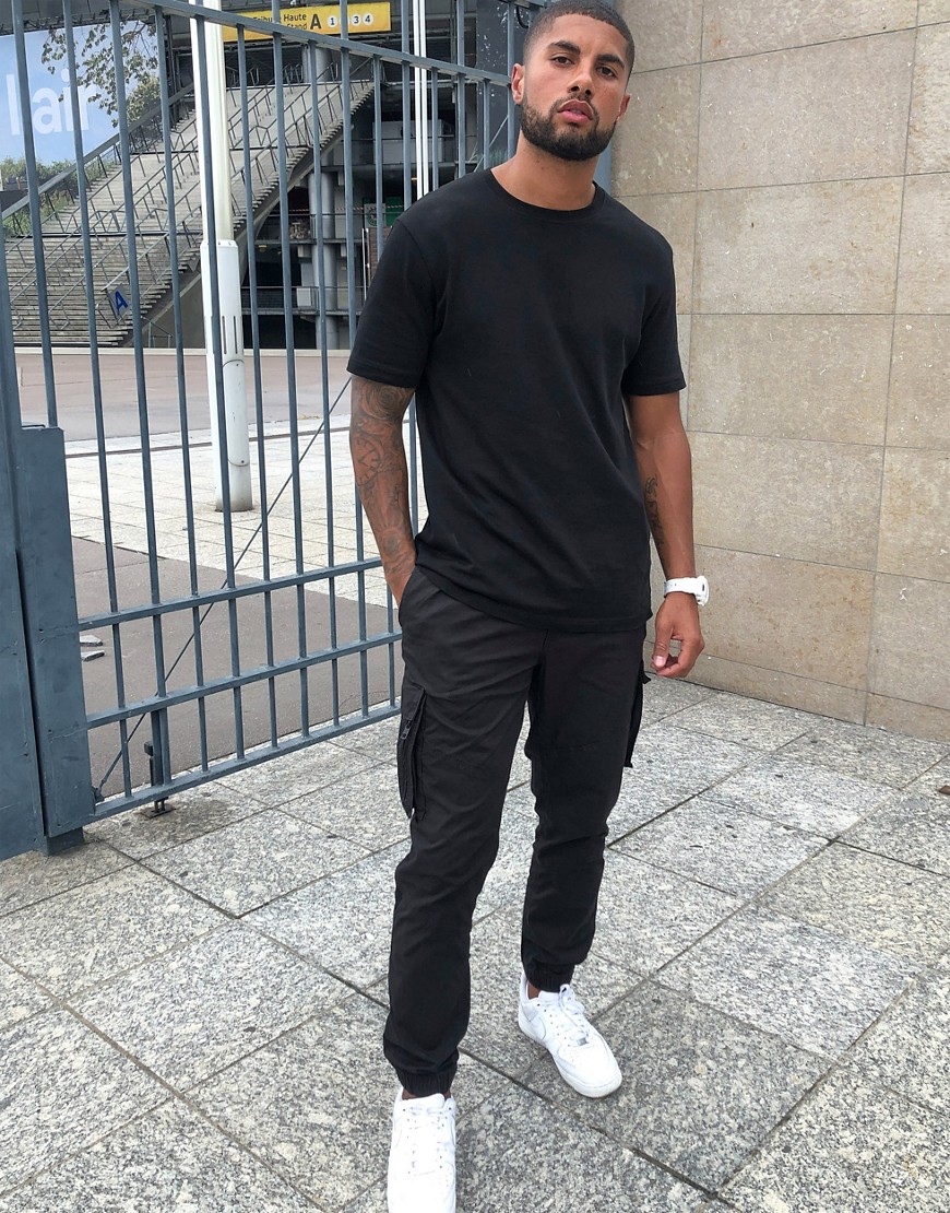 Calvin Klein Jeans - Mixed media - Smalle cargobroek met riem in zwart