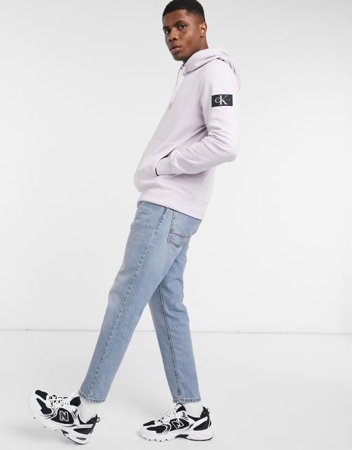 Calvin Klein Jeans monogram badge hoodie in lilac